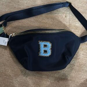 Stoney clover fanny pack with B initial.